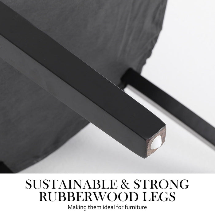 The sustainable and strong rubber wood legs being showcased with a white background