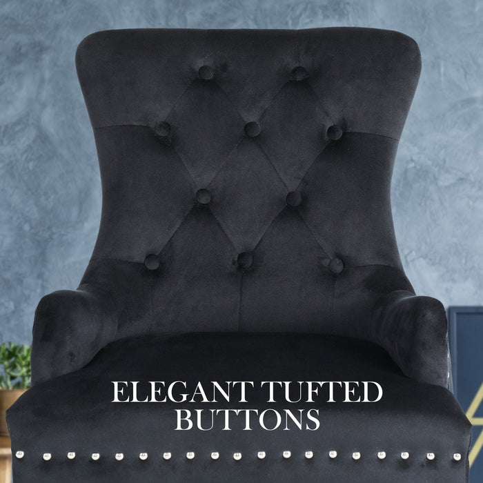 Front view of The La Bella Velvet Black French Provincial Dining Chair, showcasing its elegant tufted buttons, with a cloudy blue background.