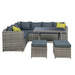 The Outdoor Dining Sofa Table Chair Lounge Set in Wicker Grey with a White Background