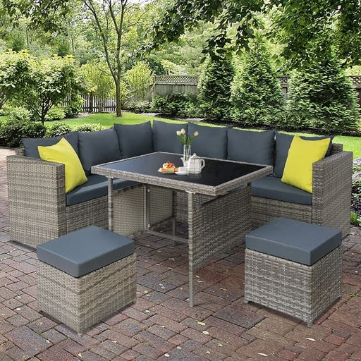 The Outdoor Dining Sofa Table Chair Lounge Set In Wicker Grey In a Gardeon Outdoor Setting